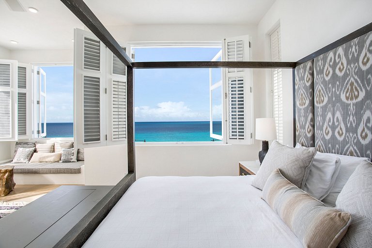 Aia009 – Villa moderna frente al mar en Long Bay Beach